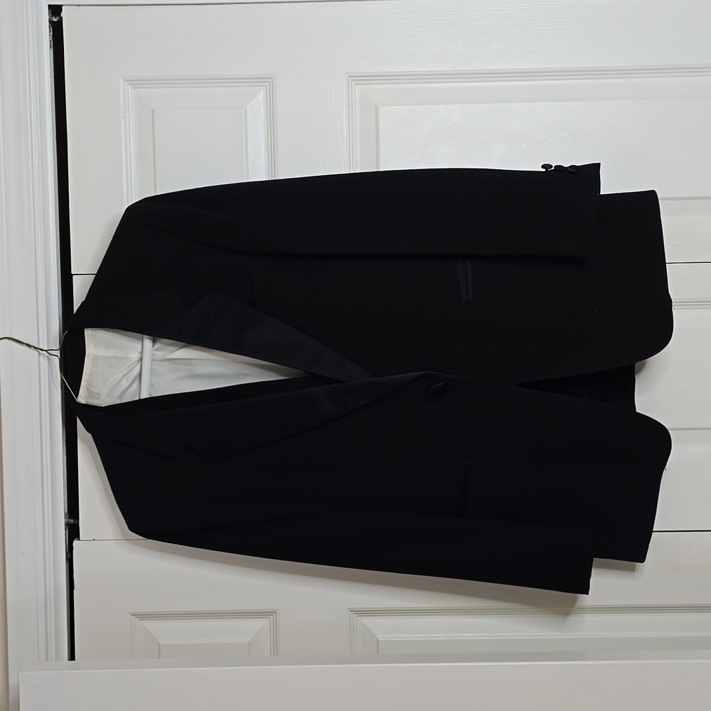 THE TUXEDO:A classic look tuxedo from Adolfo. Rich, lustrous wool.